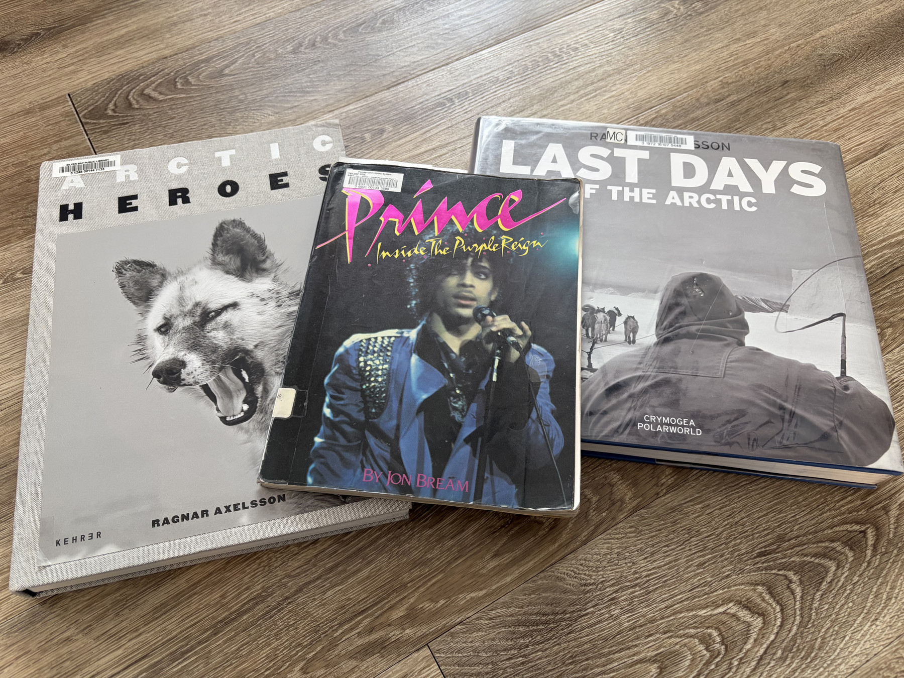 The books Arctic Heroes and Last Days of the Arctic by Ragnar Axelsson and Prince Inside the Purple Reign by Jon Bream
