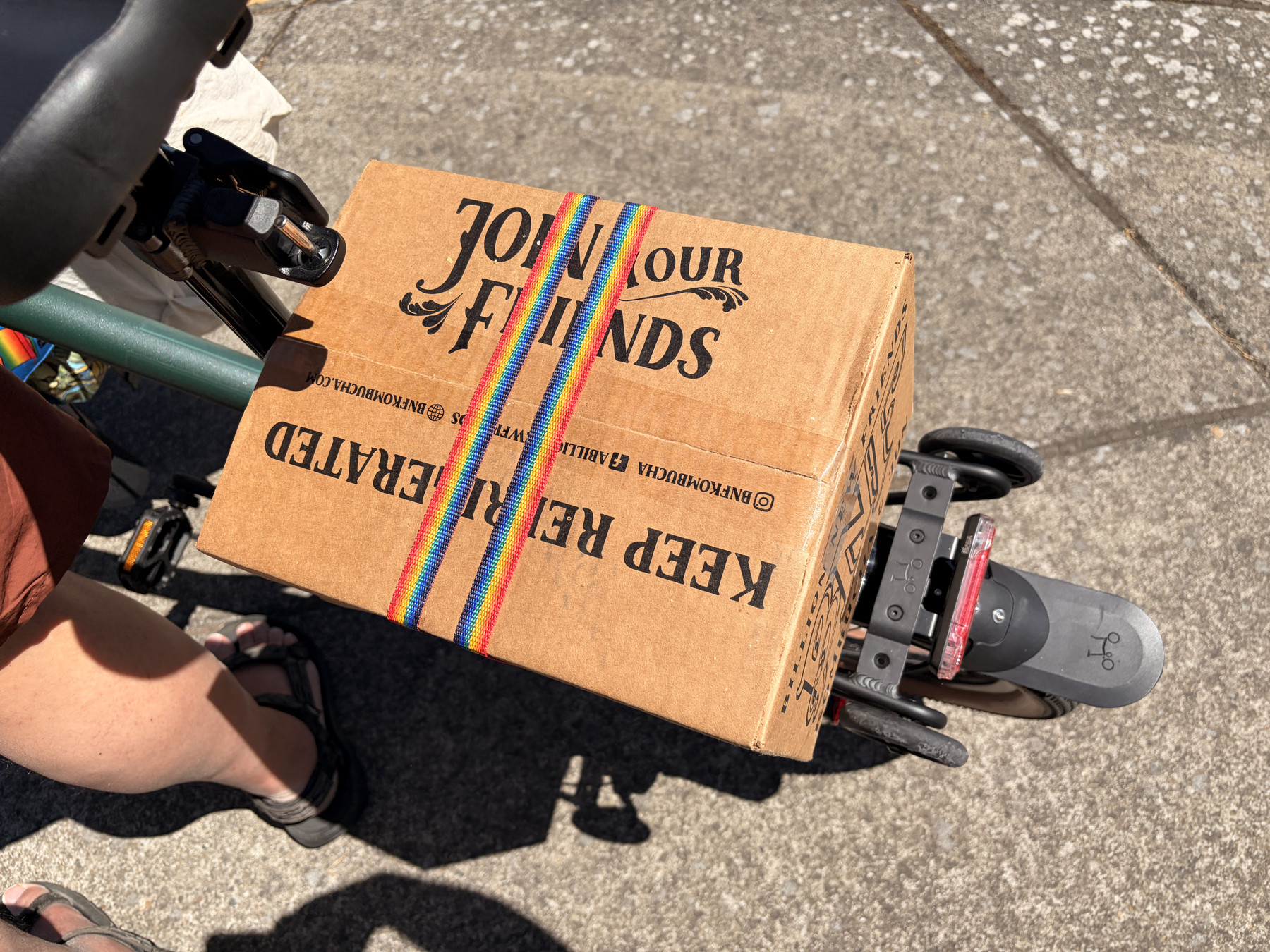 The box from above, showing the rainbow straps, which are cheerful and fun and PRIDE.