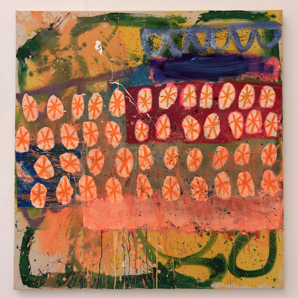 Large abstract painting with layered washes of orange, yellow, green and pink, covered in rows of peach-coloured oval shapes marked with orange starburst patterns. Dark blue and magenta blocks, looping brushstrokes, paint splatters and drips create a lively, textured composition.